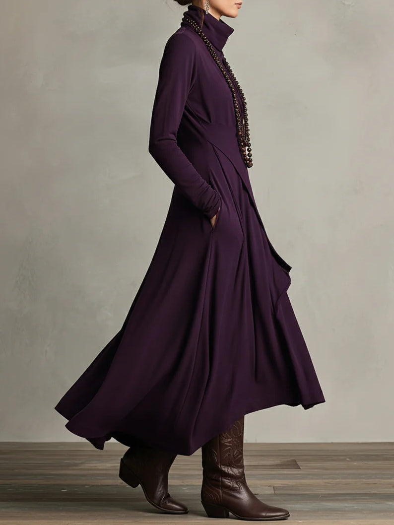 Comfortabele dames maxi jurk met hoge col en lange mouwen. Asymmetrische snit, veelzijdig voor casual chic. Met zakken.