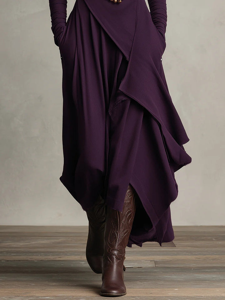 Vloeiende dames maxi jurk, hoge col, lange mouwen. Asymmetrische zoom creëert een elegante bohemian stijl damesjurk.