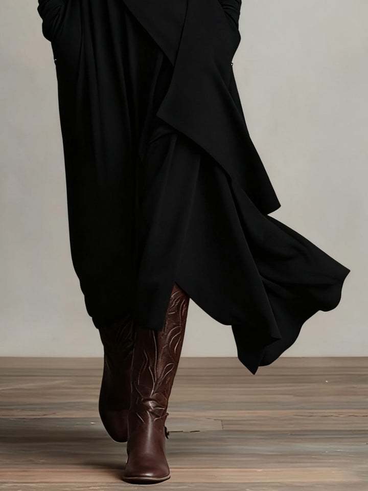 Stijlvolle damesjurk: maxi model met hoge col, lange mouwen en asymmetrische rok. Elegante, comfortabele en veelzijdige.