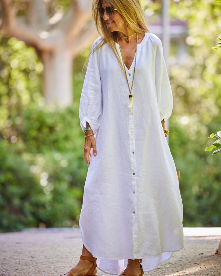 Elegante dames maxi jurk met lange mouwen, ideaal voor zomerse avonden. Veelzijdig en ontspannen zomerkleding.