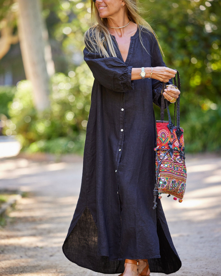 Dames zomerkleding: maxi jurk met lange mouwen. Elegant voor buiten, ontspannen en comfortabel op warme dagen.