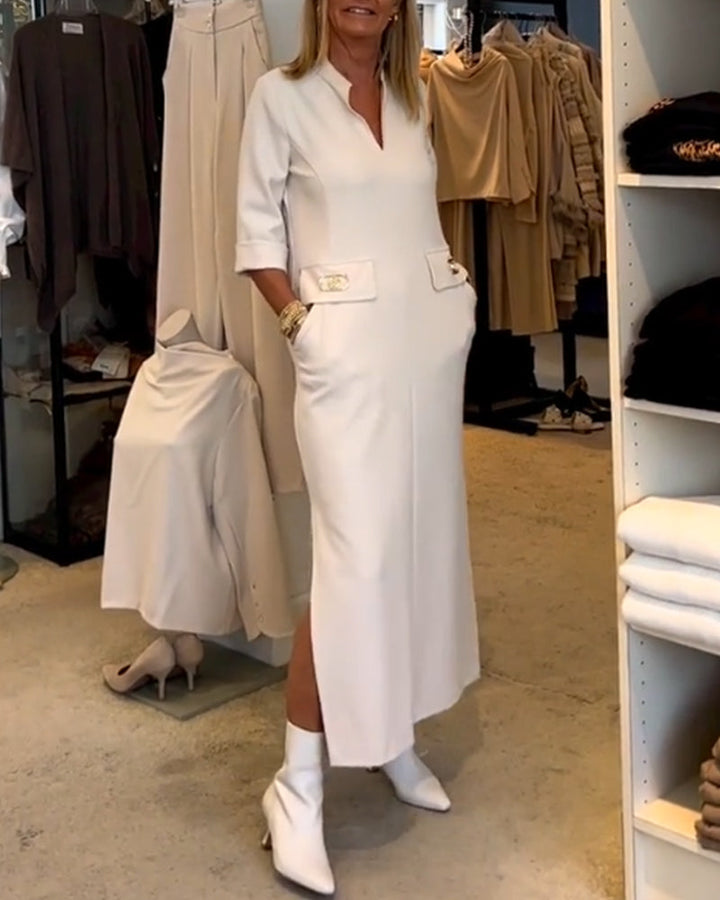 Dames maxi zomerjurk met V-hals, 3/4 mouwen en handige zakken. Comfortabele en stijlvolle casual look.