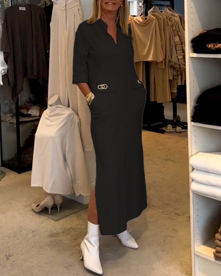 Dames maxi zomerjurk met V-hals en 3/4 mouwen, inclusief handige zakken. Stijlvolle comfortabele jurk.