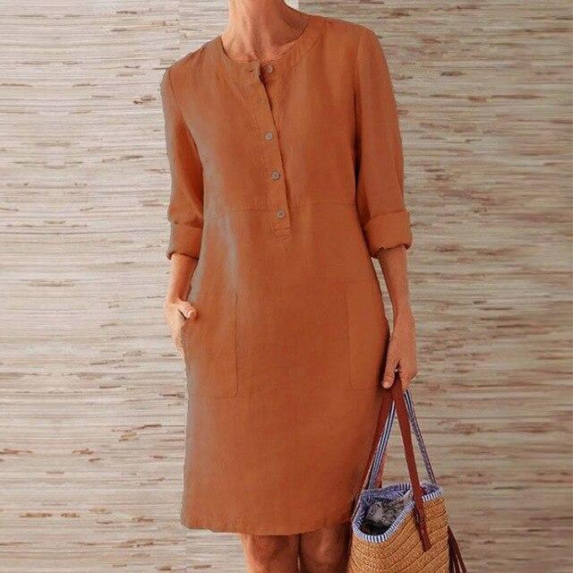 Comfortabele dames midi-jurk, luchtige zomer elegantie in oranje. Perfect voor elke gelegenheid.