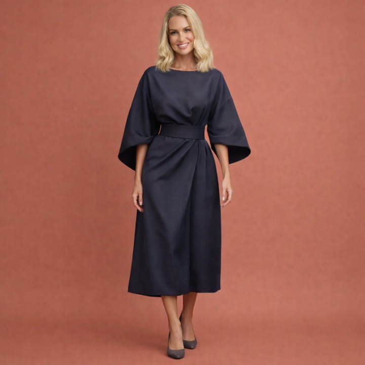 Dames midi-jurk met lantaarnmouwen en ceintuur voor een elegante, flatterende look.