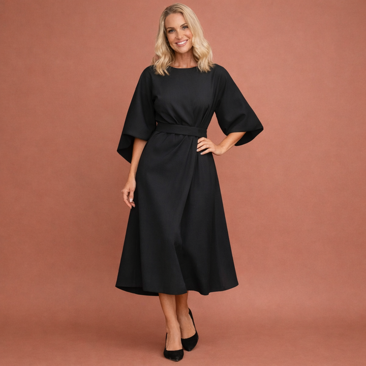 Elegante midi-jurk, perfect als feestjurk of formele avondkleding. Geschikt voor bruiloftsgasten.