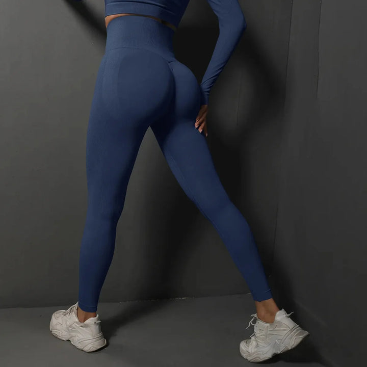 Hoge taille dames sportlegging, naadloos ontwerp voor een flatterende pasvorm en push-up effect. #hoge_taille