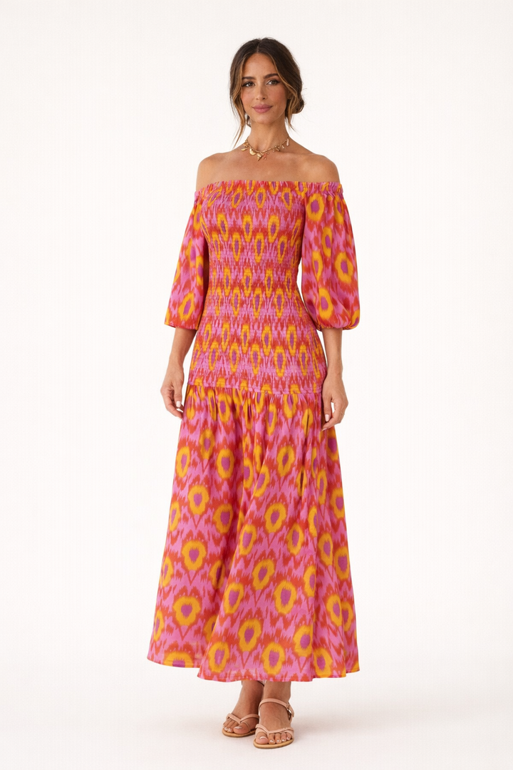 Dames off-shoulder maxi jurk met ruches en stretchy lijfje, perfect voor zomerse dagen en feesten.