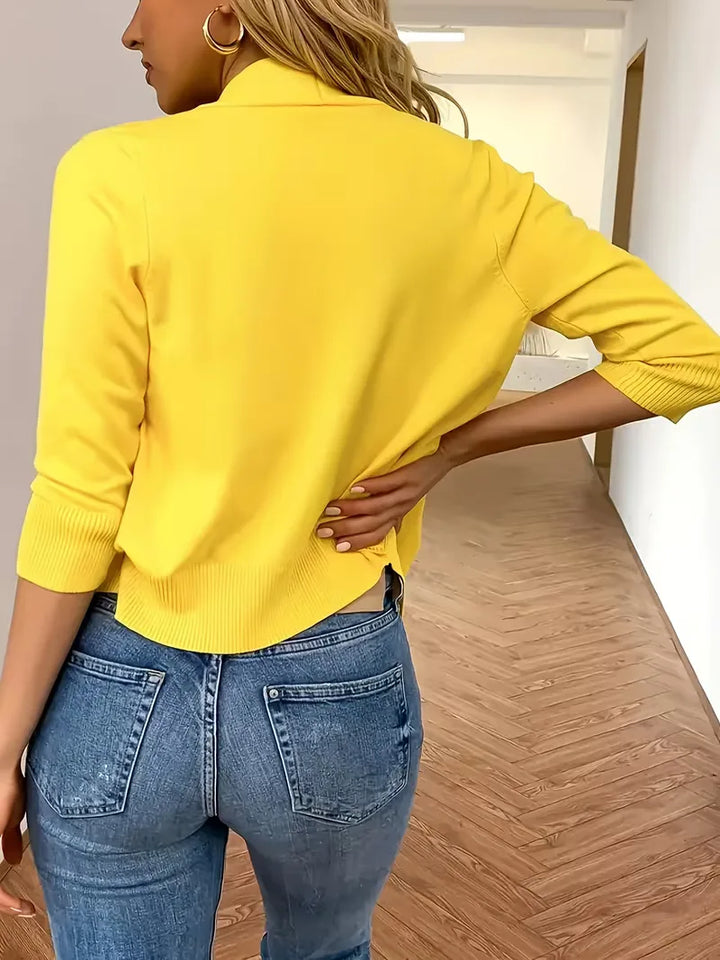 Casual dames cardigan met 3/4 mouwen, open voorkant, ontspannen en stijlvol.