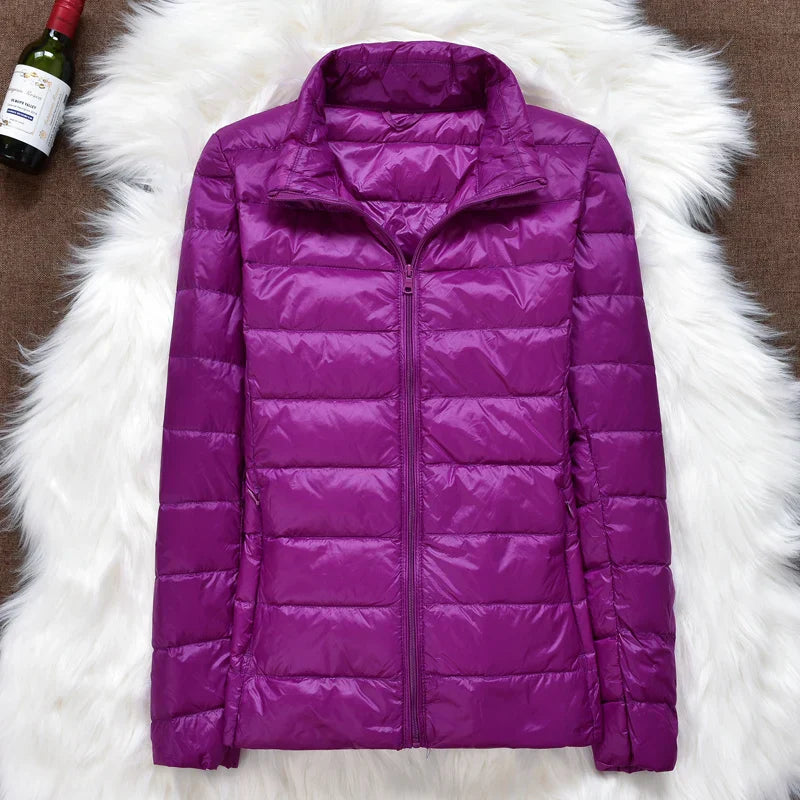 Dames winterjack, opvouwbaar en warm, met capuchon voor comfortabele herfstdagen.