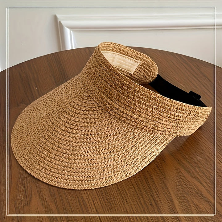 Dames opvouwbare zonneklep met brede rand, ideaal voor strand en zomer. Biedt stijlvolle UV-bescherming.