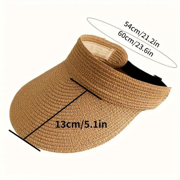 Modieuze dames zonneklep met brede rand, een trendy accessoire voor zomerse outfits en UV-bescherming.