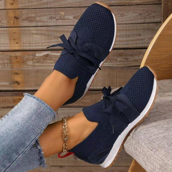 Dames sneakers met geavanceerde orthopedische ondersteuning en ergonomische binnenzool voor superieur voetcomfort.
