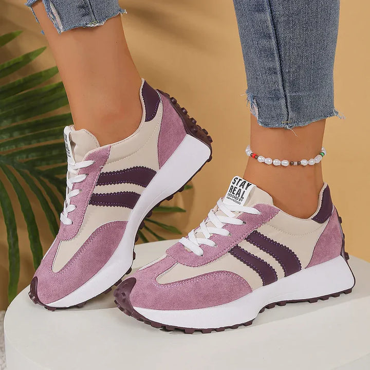 Hoogwaardige orthopedische dames sneakers met schokdemping en voetboogondersteuning voor optimaal loopcomfort.