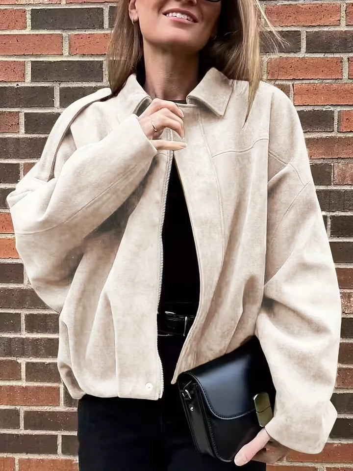 Comfortabel en oversized dames bomberjack, verkrijgbaar in abrikoos, voor casual look.