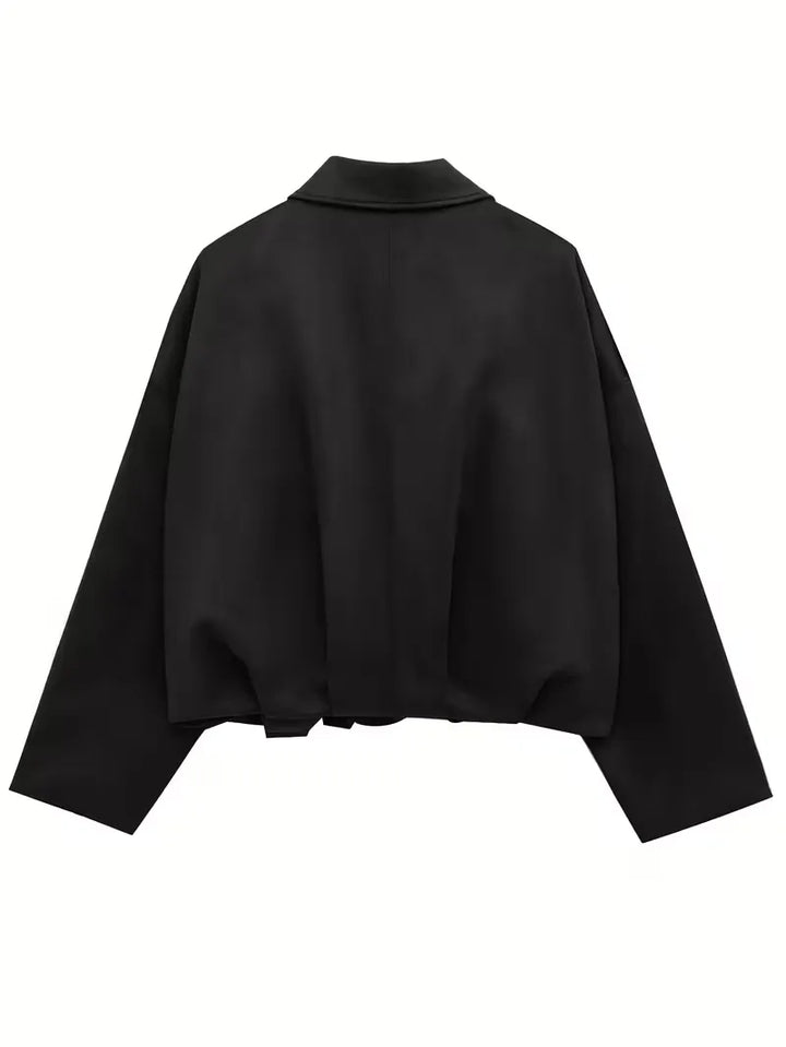 Casual abrikoos oversized bomberjack voor dames, een trendy lentejack met comfortabele pasvorm.