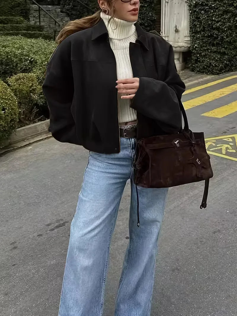 Trendy abrikoos oversized bomberjack, perfect als lentejack voor een stijlvolle damesoutfit.