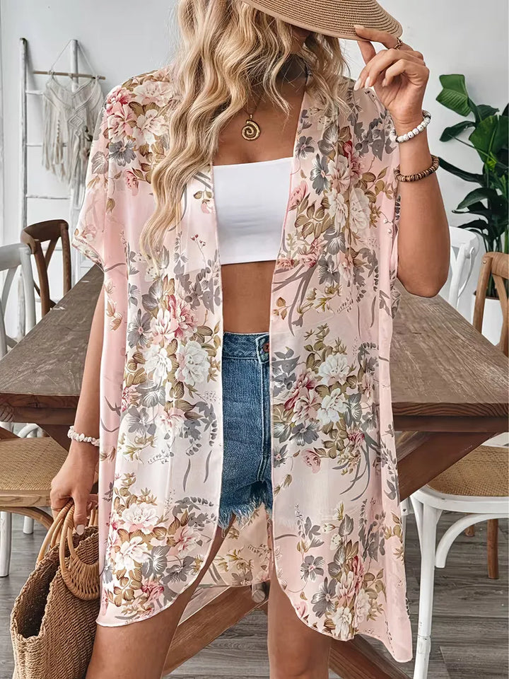 Casual oversized dames cardigan met luchtige bloemenprint, korte mouwen, perfecte strandkleding.