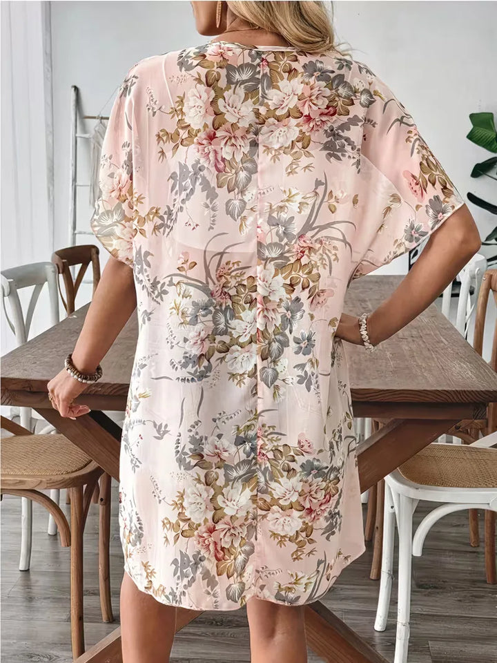 Bohemian stijl dames cardigan, lange open front mantel met kleurrijke bloemenprint. Zomerse damesmode.