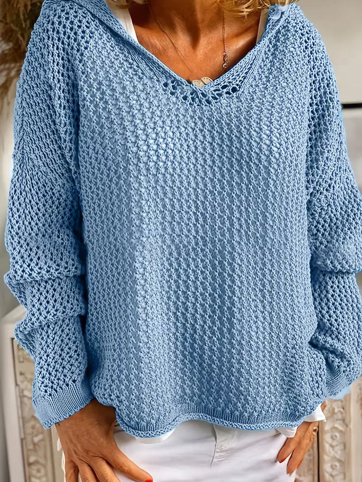 Model draagt comfortabele dames oversized hoodie. Stijlvolle capuchontrui met relaxte pasvorm.