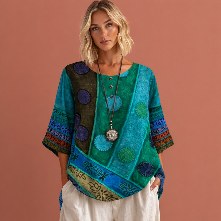 Modieuze dames oversized zomertop met kleurrijke print, ideaal voor een relaxte lente/zomer casual stijl.