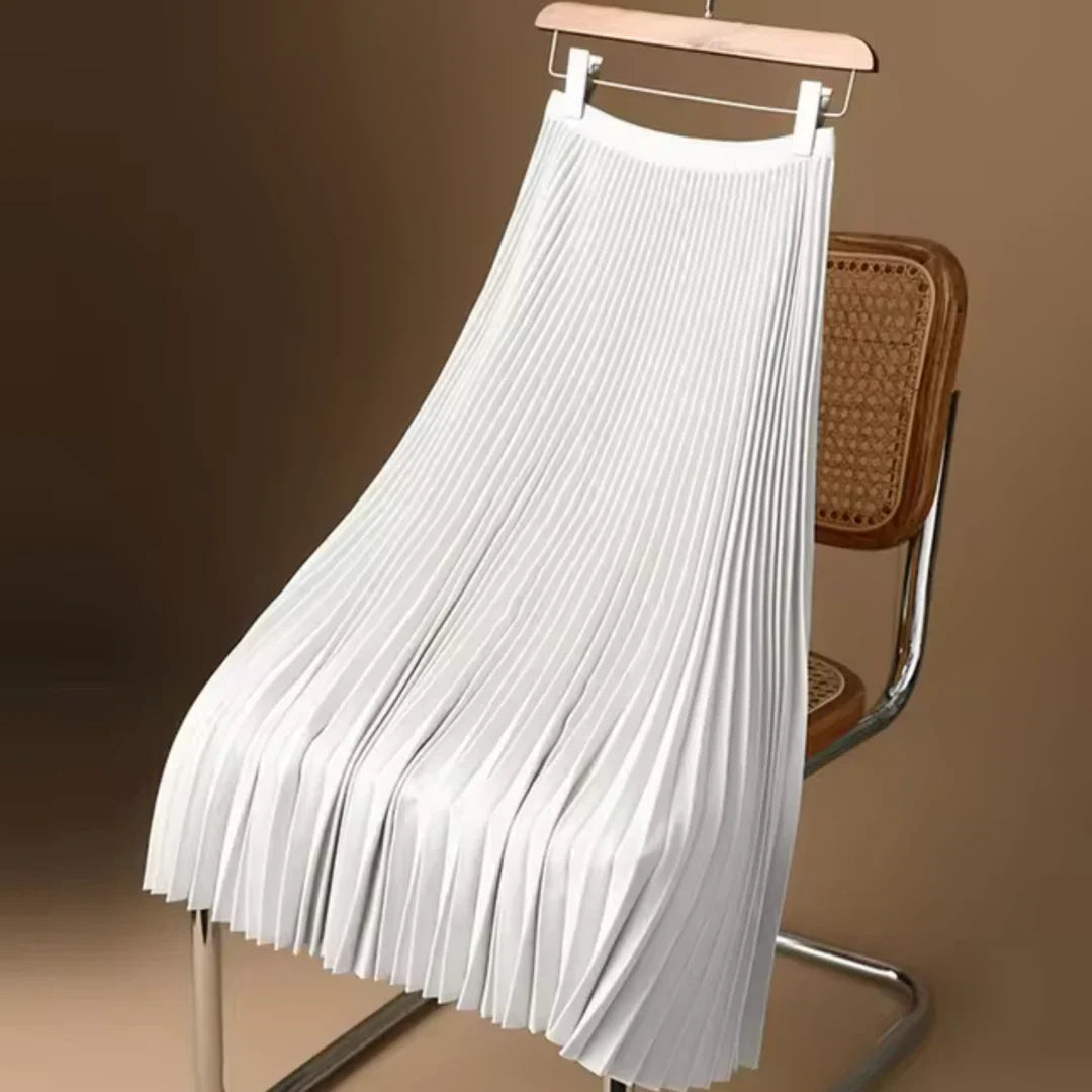 Klassieke, doch trendy dames plooirok. Combineer elegantie met draagcomfort.