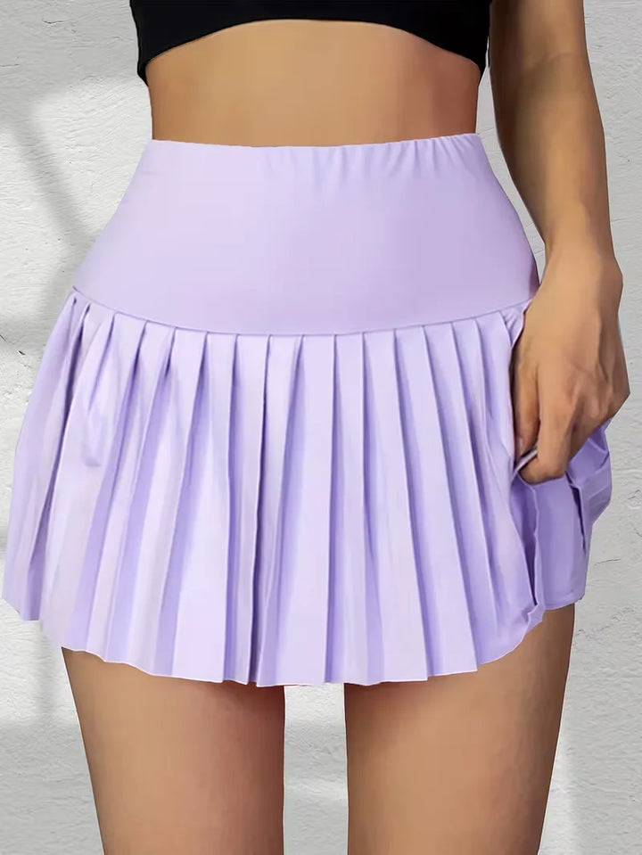 Comfortabele hoge taille plooirok. Deze dames zomerrok is ideaal voor een casual, sportieve of elegante look.