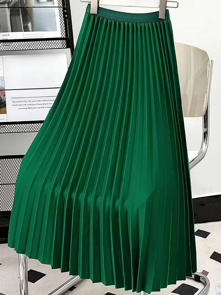 Vrouwelijke plooirok midi met hoge taille, flatteert elk figuur en is elegant. Comfortabel en stijlvol.