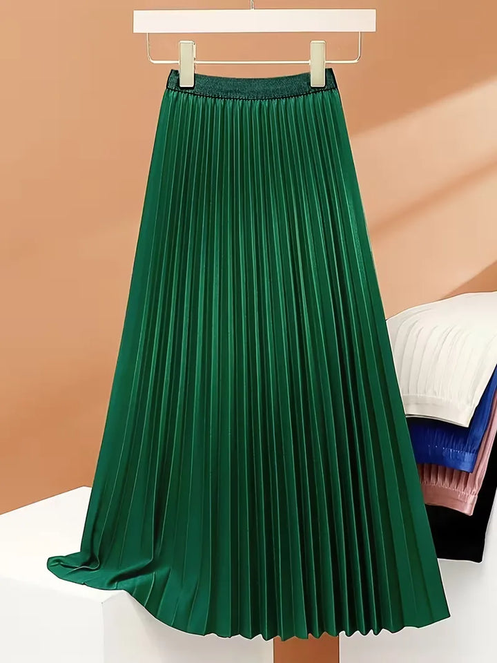 Geniet van comfort en stijl met deze dames plooirok, midi en hoge taille. Ideaal voor lente en zomer.