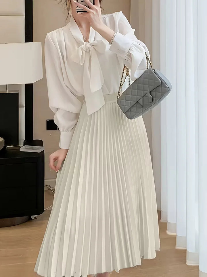Smart casual plooirok voor dames, hoge taille en midi lengte, moeiteloos chic en comfortabel. Stijlvol.