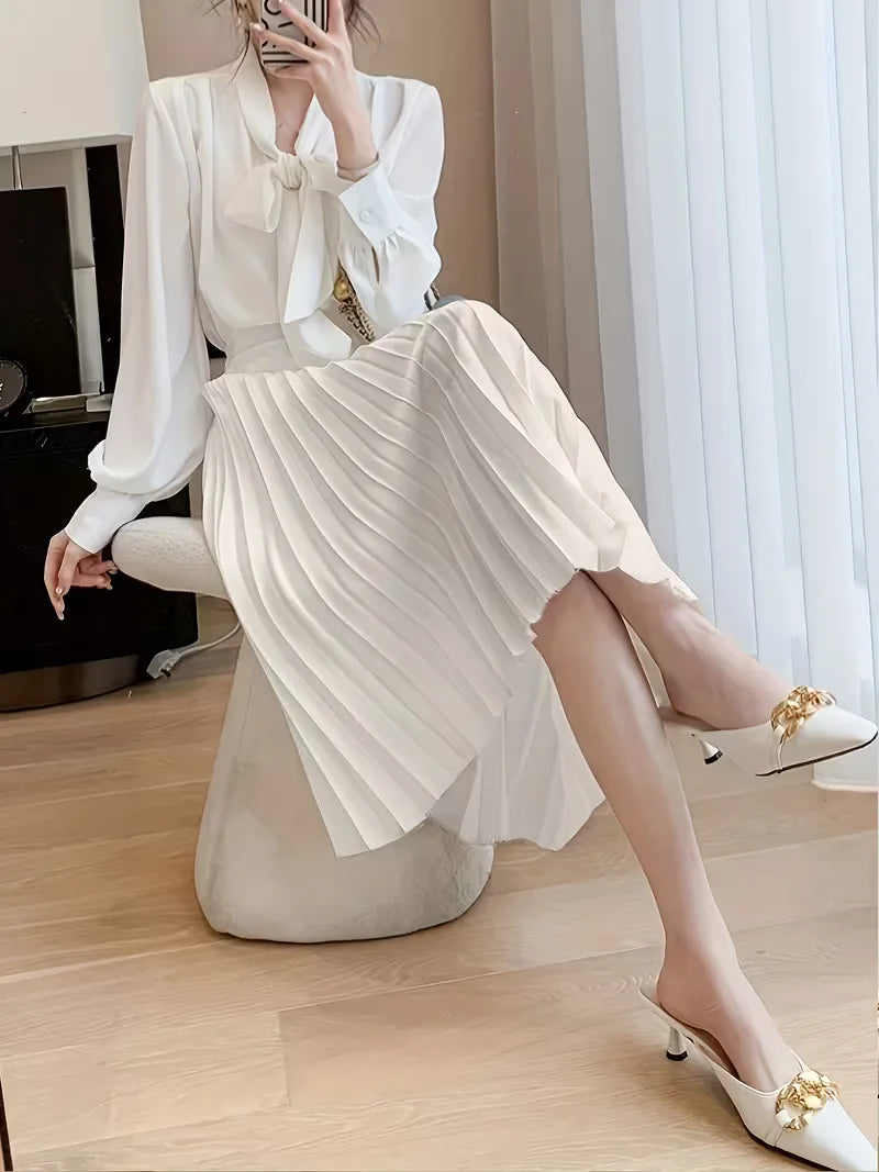 Trendy dames plooirok midi met hoge taille, een must-have voor een stijlvolle lente-zomer garderobe. Elegant.
