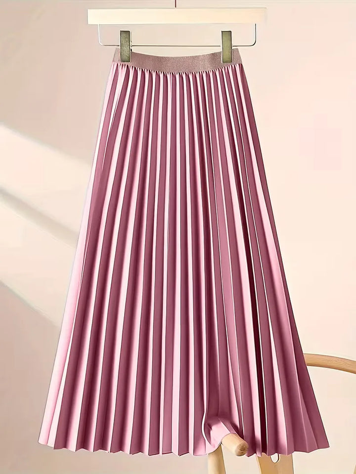 Veelzijdige dames plooirok met hoge taille, ideaal voor smart casual en zakelijke lente-zomer outfits.