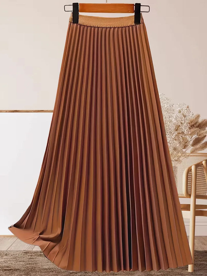 Zwevende midi plooirok voor dames met hoge taille, creëert een dynamische en elegante zomerse look.