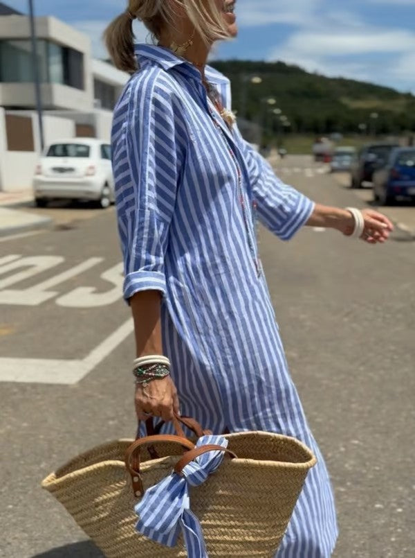 Dames polo midi zomerjurk met knoopsluiting en 3/4 mouw, ideaal voor een casual of elegante look.
