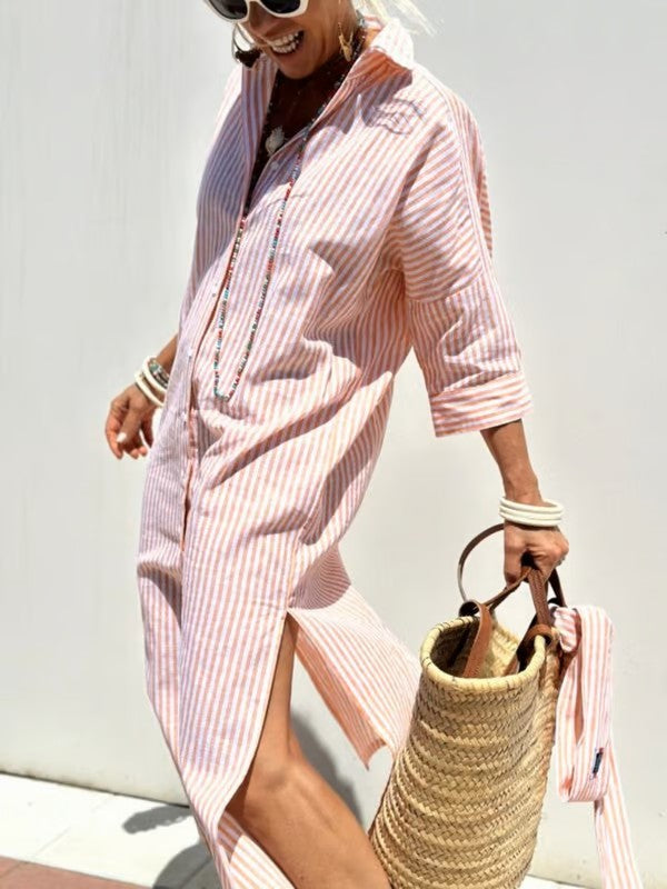 Lichte dames zomerjurk in polo stijl, comfortabel met 3/4 mouw en handige knoopsluiting.