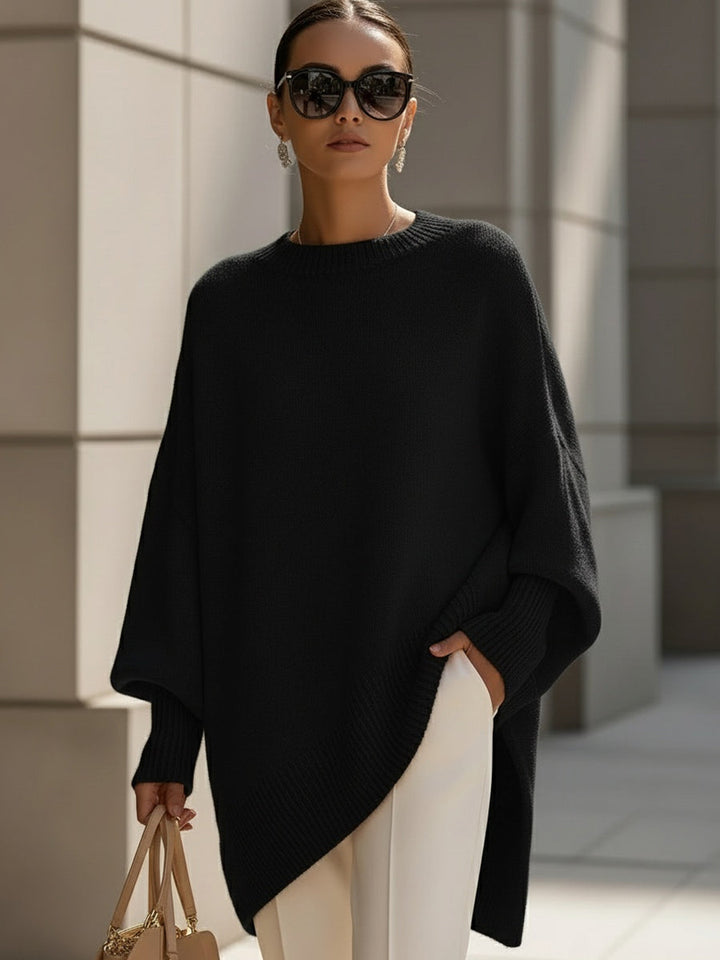 Losvallende dames poncho-pullover, comfortabel en casual met een moderne asymmetrische zoom. Perfect voor dagelijks gebruik.
