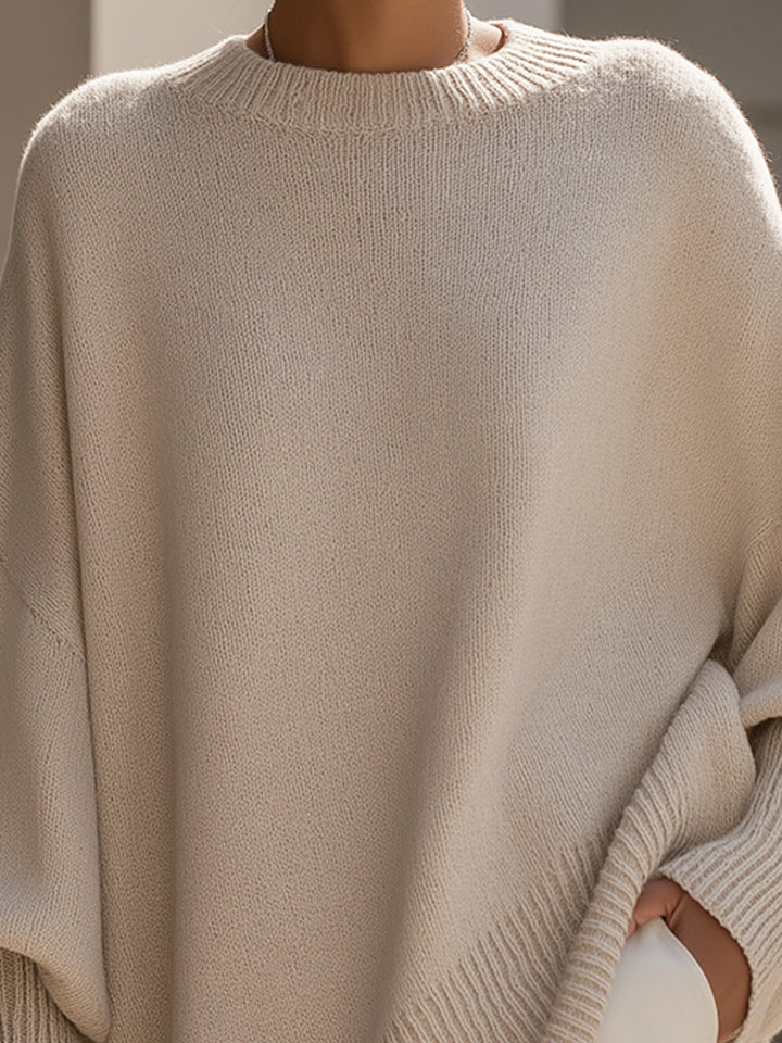 Stijlvolle dames poncho-pullover, oversized en elegant met asymmetrische zoom voor herfst en winter.