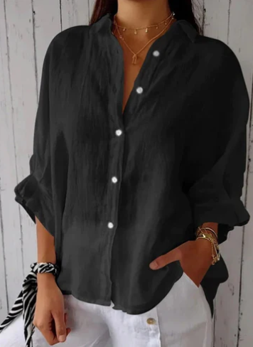 Stijlvolle damesblouse met knoopsluiting en relaxte pasvorm. Veelzijdig voor lente en zomer, casual mode.