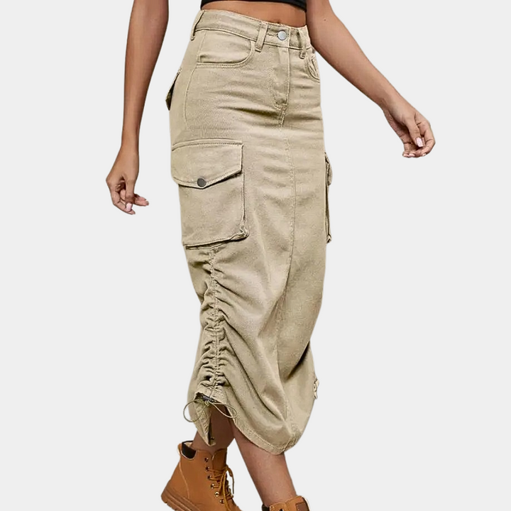 Trendy dames cargo rok met praktische zakken, combineert comfort met retro elegantie.
