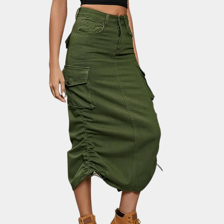 Deze trendy dames cargo rok combineert retro charme met een moderne stijl. Ideaal als veelzijdige zomerse midi rok.