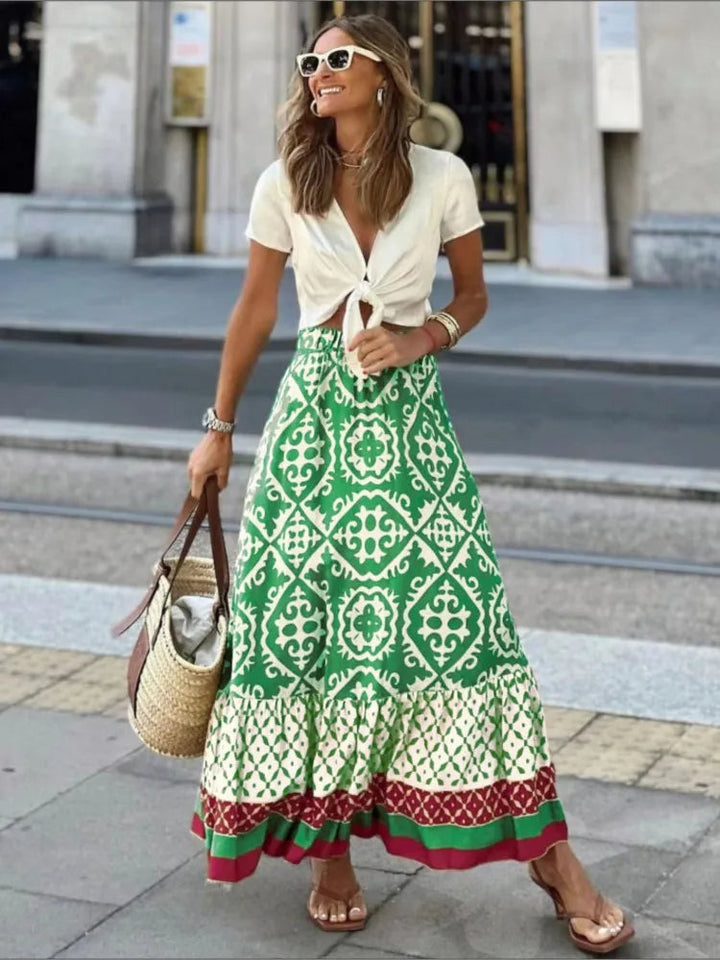 Dames retro print midi rok met ruches, ideaal voor een elegante zomerse look.