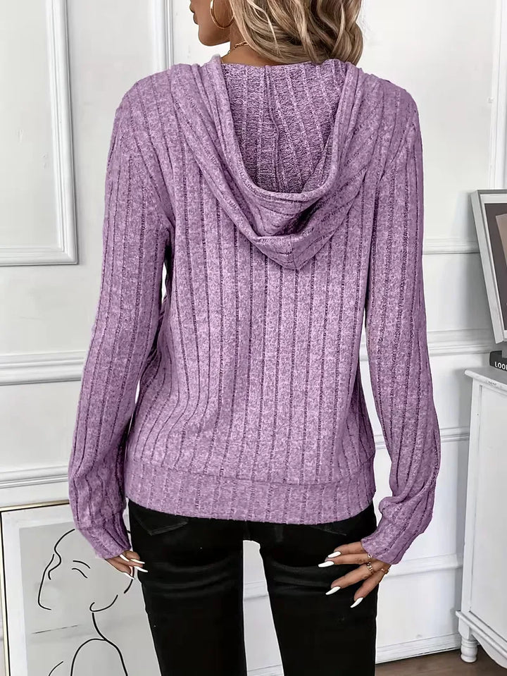 Dames capuchontrui van ribbelstof, warme lange mouwen, perfect voor loungewear.