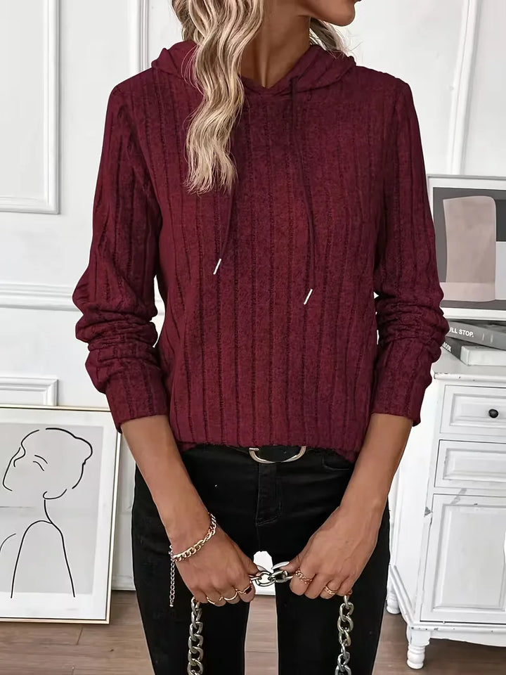 Ontspannen dames ribbel hoodie met ruime capuchon, ultiem comfort.