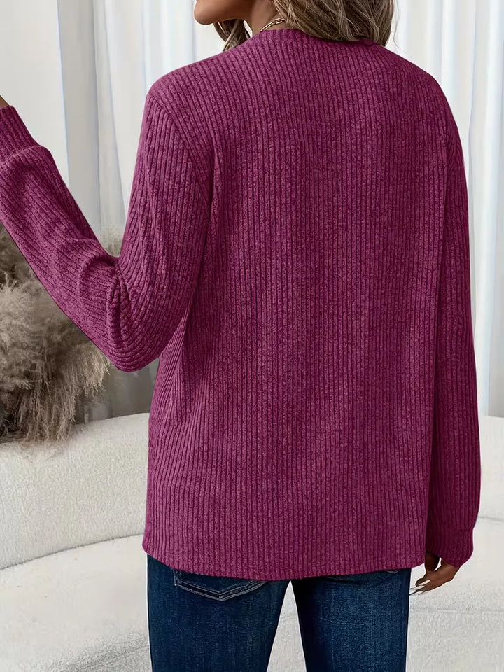 Comfortabele ribbeltrui voor dames, lange mouwen en ronde hals, ideaal voor loungen.