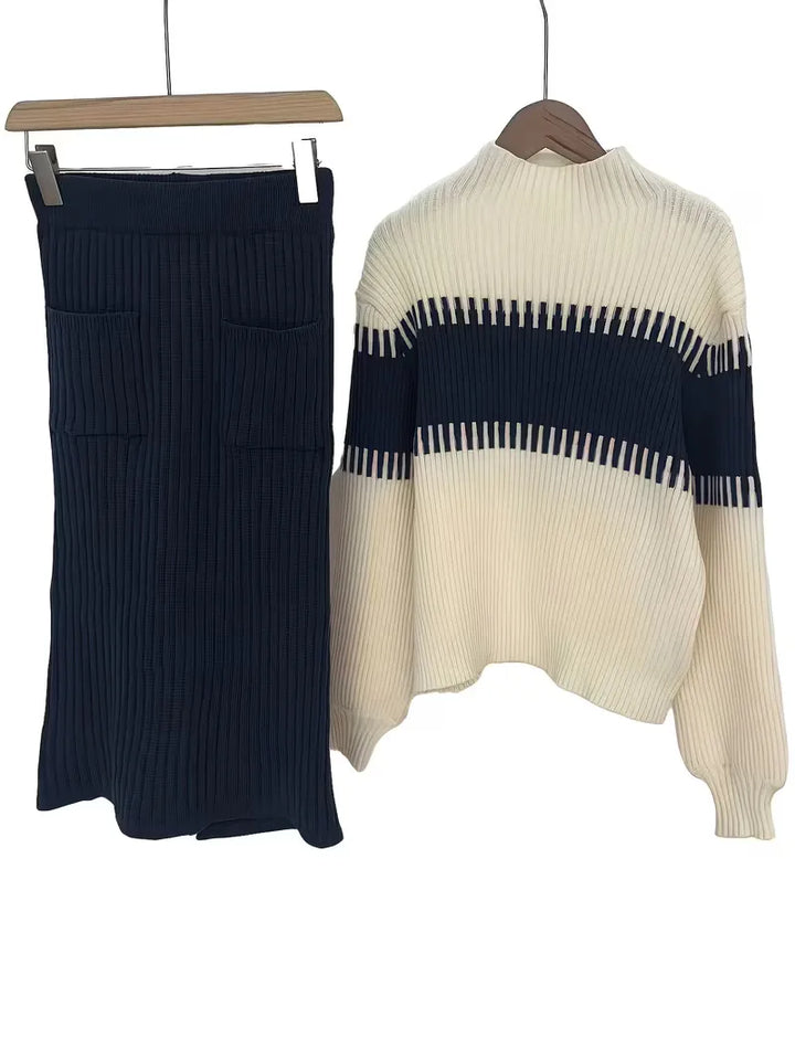 Elegante dames outfit: ribgebreide trui en rok, perfect voor smart casual.