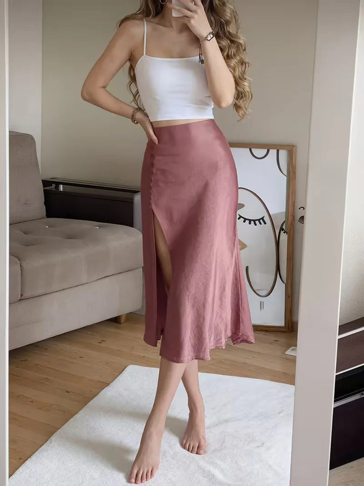 Stijlvolle dames satijnen midi rok met hoge split, perfect voor een avondlook.