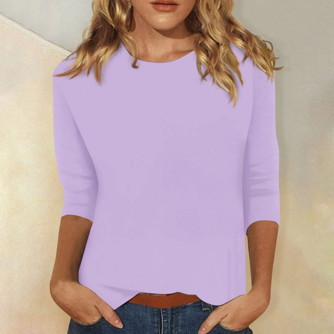 Effen dames shirt met lange mouwen en klassieke ronde hals. Een comfortabel, veelzijdig item dameskleding.