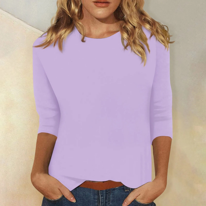 Effen dames shirt met lange mouwen en klassieke ronde hals. Een comfortabel, veelzijdig item dameskleding.