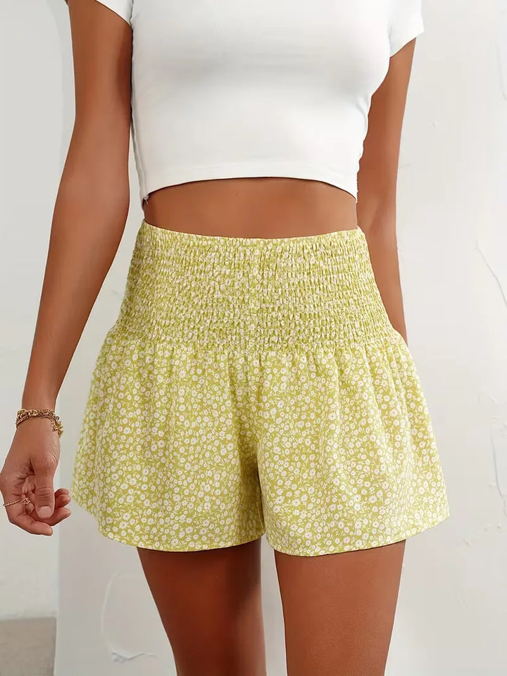 Zomerse dames short met bloemprint, hoge taille en comfortabele wijde pijpen.