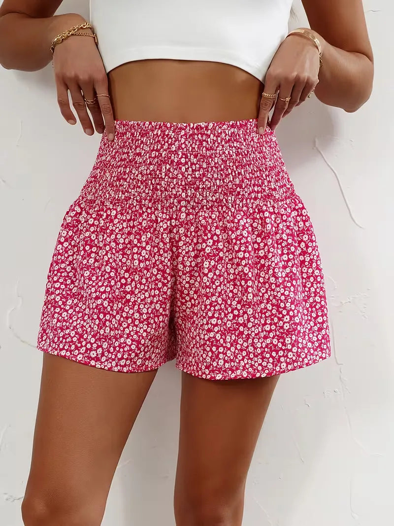 Trendy hoge taille short voor dames, met frisse bloemenprint. Perfect voor zonnige dagen.